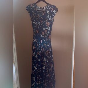 Papulillion maxi dress in XS and fits a size 6-8